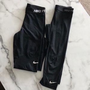 Two Black Capri Nike Leggings